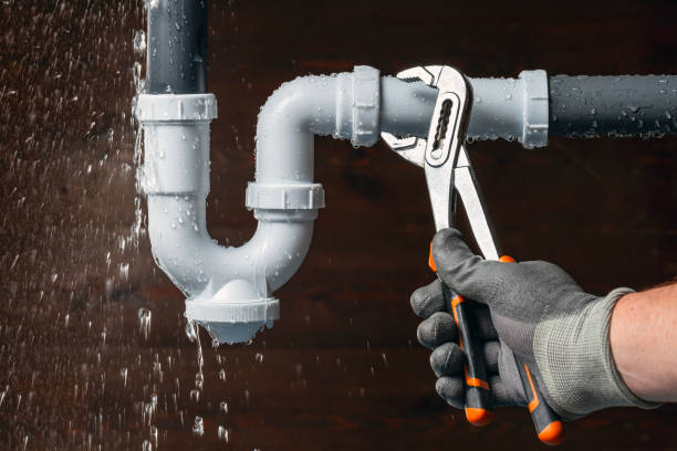 Professional Drain Cleaning technician working in Roland, OK